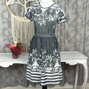 Gabby Skye floral laser cut fit and flare dress